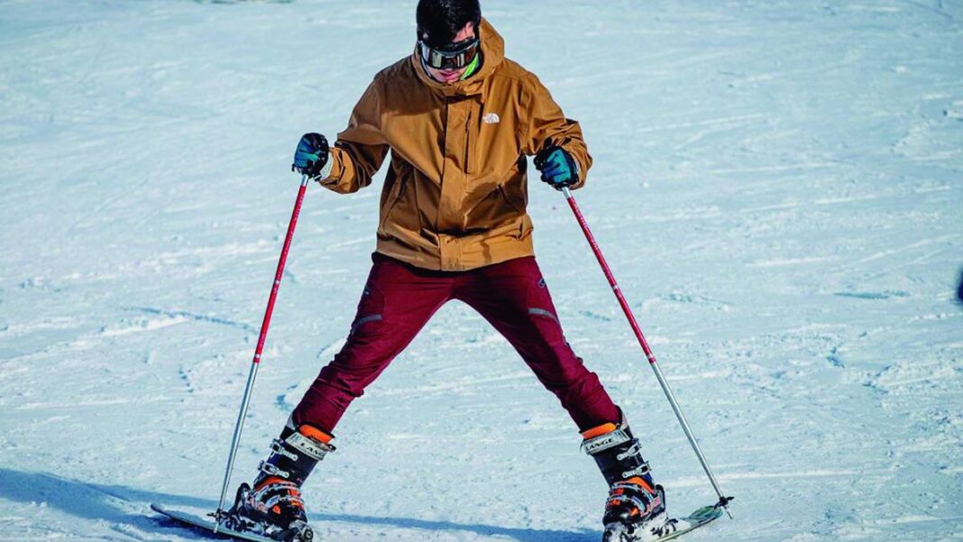 Vista panorámica de Bariloche en invierno, con montañas nevadas y el lago Nahuel Huapi.