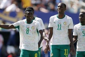 Jugadores de la selección de Senegal durante un partido de fútbol