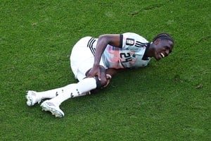 Amadou Onana lesionado durante partido Bélgica vs Estados Unidos Mundial 2026