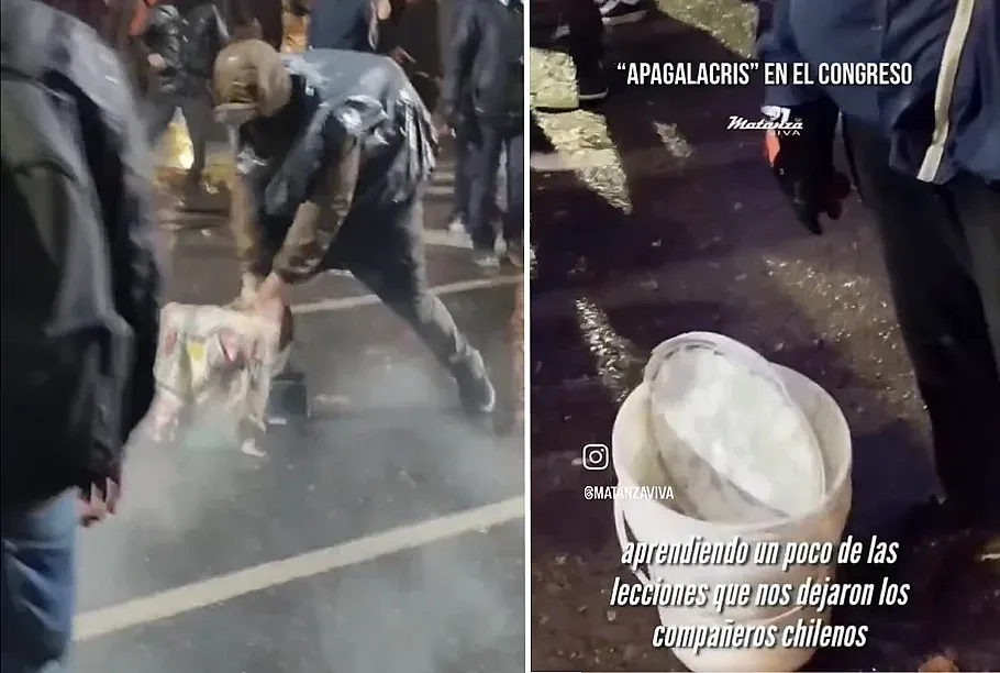 Manifestante con balde de mezcla de bicarbonato durante protesta en Santa Fe