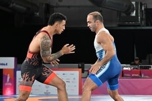 Arsen Julfalakyan durante la final de Lucha Grecorromana en los Juegos Suramericanos Santa Fe 2026