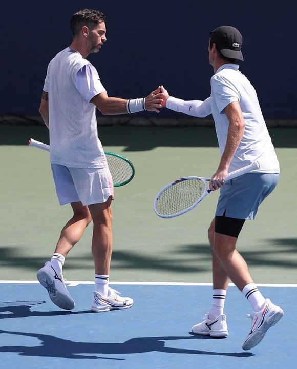 Horacio Zeballos y Guido Andreozzi durante un partido de dobles